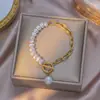 Pulsera de acero titanio perla al por mayor transfronteriza para mujer Corea del Sur Dongdaemun temperamento simple moda Joker hebilla OT pulsera de costura