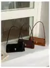 Bolso vintage de alta costura para el hombro para mujer, nuevo bolso de hombro de nicho francés 2026, bolso baguette elegante y sencillo