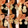 Aretes largos retro de pétalos grandes estilo europeo y americano transfronterizo, personalidad, celebridad de internet, mate, exagerados, geométricos para mujer, al por mayor
