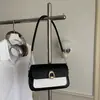 Bolso cuadrado pequeño de hombro cruzado de comercio exterior estilo coreano con cierre de broche, bloques de color, nueva moda 2026, casual, simple, texturizado, gran capacidad