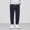 Moda Masculina Fengshe / Nova Coleção Primavera e Outono 2026 Estilo Americano Novo Corte Solto Fleece Boa Bordado Alta Elasticidade Calça Jogger Casual Masculina