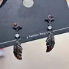 Amor e Espaço Profundo Qin Che Fantasia Sombria Asas Brincos Personalidade Doce Cool Nicho Luxo Leve Estilo de Alto Padrão Novos Brincos da Moda