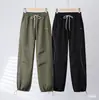 Pantalones de senderismo luminosos de carcasa dura con forro polar, a prueba de viento, impermeables, corte recto ajustado, que alargan las piernas 10530