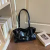 Bolso tote de nicho estilo coreano con decoración de cinturón para mujer, nuevo bolso de hombro simple para el otoño de 2026, bolso de axila