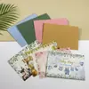 Set de tarjetas de agradecimiento de Amazon con estampado de lámina dorada, tarjetas plegables en blanco estilo ins en inglés con sobres para saludos navideños transfronterizos