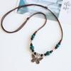 Collar de mariposa de cerámica de estilo étnico retro artístico, suministro de fábrica, colgante de nicho de estilo chino para mujer, collar a juego