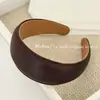 Faixa de Cabeça Larga de Couro Vintage 2025 Nova Coroa Alta Afina o Rosto Faixa Pequena Elegante Diária Presilha de Cabelo para Usar por Cima