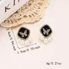 Estilo coreano novo estilo luxo leve design de esmalte preto pingado estilo palácio brincos versáteis brincos borboleta de diamante pérola retrô
