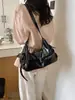 Bolsa Coreana de Nicho Estilo Motociclista para Mulheres 2026 Nova Tendência Moda Doce Cool Bolsa Tote Grande Capacidade Bolsa de Mão Bolsa de Trabalho