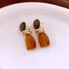 Pendientes Redondos de Madera Geométricos de Resina Retro Europeos y Americanos Lujo Accesible Pendientes de Gama Alta Diseño de Pendientes Personalizados Nicho