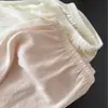 7602 Shorts de Seguridad de Seda de Hielo Dos en Uno Minimalistas Satinados Tipo Perla para Mujer, Estilo Delgado de Verano Anti-Exposición