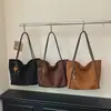 Bolso de gran capacidad transfronterizo, estilo relajado, para mujer, nuevo bolso tote retro para el día a día 2026, bolso de hombro simple y versátil