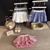 Falda corta de cuadros estilo coreano, línea A, estampado floral, de cintura alta, con shorts incorporados para evitar la exposición, dulce y femenina, adecuada para el verano, falda acampanada