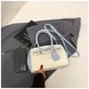 Bolso de Mano de Bloques de Color de Alta Gama Estilo Nuevo Primavera 2026 Bolso Pequeño Cuadrado Platino para Mujer Versátil para el Trabajo Hombro Cruzado Bolso Kelly