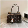 Bolso de mano de gran capacidad con lunares para mujer, nuevo modelo de verano 2026, bolso tote elegante y atractivo, bolso cruzado de moda para ir al trabajo