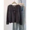 Suéter de punto para mujer con cuello en V y patrón trenzado, cordón, lazo, atado, top de suéter holgado y adelgazante, moda otoño 2026