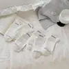 Calcetines de algodón puro para mujer, nuevo estilo de otoño, calcetines de encaje hasta la mitad de la pantorrilla, calcetines dulces JK con borde de burbujas, combinados con zapatos pequeños de cuero, calcetines blancos