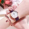 Atmósfera de moda Chicas de preparatoria ven moda casual Joker nicho pequeño fresco cuarzo reloj de mujer al por mayor en stock