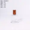 Difusor de Aroma Simple Botella Stock de Fábrica Botella de Vidrio Blanco Cristalino Fondo Grueso Cuadrado Plano Estilo Alto Botella Difusora de Aroma 50ml 100ml