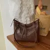 Bolso tejido retro de gran capacidad para mujer, nuevo bolso tote de moda coreana 2026, bolso grande simple para hombro o axila