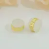 Tapón de silicona de moda antideslizante con anillo de acero inoxidable de oro real de 18 quilates, tapón de oreja transparente de hamburguesa, tapón trasero anti-caída al por mayor