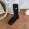 Calcetines de tubo para mujer con lazo bordado, color sólido, estilo simple ins, doble aguja sin costuras, calcetines para niña de rayas verticales apilados