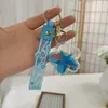 Llavero de Botella de Arena Líquida de Dibujos Animados, Pequeños Regalos para Puestos, Accesorios Acrílicos al por Mayor, Colgante Relleno de Aceite, Rasca Gatos Lindo de Regalo