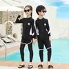 Traje de baño mediano y grande para niños y niñas, pantalones largos de manga larga, nuevo, protección solar, secado rápido, traje de buceo dividido, traje de baño
