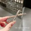 Pinzas para el cabello de pedrería brillante de lujo estilo coreano Dongdaemun Primavera 2026 para mujer, Colección de accesorios para el cabello de la frente