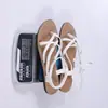 Sandalias planas tejidas de chanclas de comercio exterior europeo y americano para playa 2026 nuevas casuales transfronterizas talla grande sin cordones para mujer