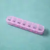 Caja de medicamentos semanal transparente de siete celdas para comercio exterior, portátil, a prueba de humedad, embalaje para siete días, fabricantes de cajas de medicamentos en stock al por mayor