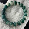 Bodhi ao redor do dedo macio Raiz de Bodhi flutuando profundamente Pulseira Bodhi verde profundo verde profundo metade montanha metade água pele de flor pulseira de raiz de Bodhi
