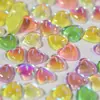 Decoración de arte de uñas con forma de corazón de macarrón fluorescente tridimensional de cristal mágico de diamante de caramelo de amor de red roja para venta al por mayor