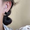 Exquisitos pendientes de doble cara con hebilla de oreja de trébol de cuatro hojas y circonita AB, elegantes y a la moda para uso diario, nuevos y combinables con todo.
