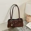 2026 Nova Bolsa de Ombro Único Elegante Tendência de Alto Valor Temperamento Simples Relaxado Nicho Casual Bolsa de Axila