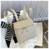 Mochila Única con Textura 2025 Primavera/Verano Nueva Moda Trendy Versátil Lona Bolso Tote Estudiante Mochila de Viaje