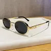 Retro Simple Nuevo Marco Ovalado Metal Moda Marco Pequeño Hombres Mujeres Gafas de Sol Personalidad Versátil Tendencia Gafas de Sol
