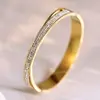 Pulsera de Trébol de Cuatro Hojas Pulsera de Acero Inoxidable para Mujer Pulsera de Acero de Titanio Color Dorado con Diamantes Estilo Blanco y Negro Joyería Que No Se Desvanece Transfronterizo