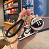 Novo Chaveiro Criativo de Tênis de Basquete Pingente Requintado para Casal Mochila Escolar Chaveiro de Carro Pingente Presente Venda por Atacado