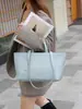 Nuevo bolso de mano para mujer hecho de cuero genuino, bolso de hombro, bolso tote de piel de vaca transfronterizo, bandolera de nicho, cuero suave vintage, gran capacidad