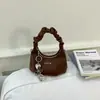 Nueva Bolsa para Lonchera Tejida Primavera y Verano 2026 con un Diseño Moderno, Bolso Cruzado de un Solo Hombro para Mujer con un Toque de Lujo, Simple y Versátil
