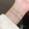 Pulsera Colgante Corazón de Circonita Bañada en Oro Real de 18K Moda Retro Pulsera Sencilla Lujo Accesible Joyería de Mano de Alta Gama para Mujeres