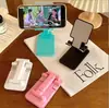 Soporte para teléfono móvil plegable telescópico de escritorio perezoso para tableta clase en línea en vivo multiusos portátil fabricante regalo suministro