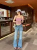 Jeans boca de sino com estampa de leopardo azul claro lavado retrô americano para mulheres, novo para o verão de 2026, jeans boca de sino justos e elásticos