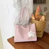 Bolsa feminina de grande capacidade para uso transfronteiriço, nova coleção outono 2026, bolsa de ombro versátil e elegante, bolsa tote moderna e casual para o trabalho e uso diário