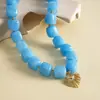 Collar de cuentas geométricas degradado colorido transfronterizo europeo y americano, cadena para la clavícula estilo resort de playa, joyería de lujo ligero de alta gama al por mayor