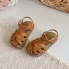 Faixa de Cabeça para Meninas Sandálias Romanas Tecidas Antiderrapantes Verão 2026 Novas Sapatos de Praia Versáteis Vazados Respiráveis Sola Macia