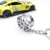 Guangzhou en stock coche modificado cubo de rueda forma de simulación llavero de metal personalidad discreta regalos creativos transfronterizos