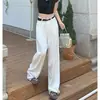 Jeans blancos de pierna ancha de cintura alta para el día a día Nuevo popular 2023 holgados adelgazantes estilo perezoso pantalones de campana fluidos