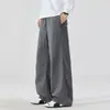 Pantalones casuales de algodón mezclado a rayas para hombre, estilo coreano de primavera y otoño, holgados, de pierna recta, pantalones de trabajo estilo harén, modernos.
